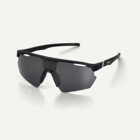 Tyffco Vittorio sunglasses in Black with smoke lens, gold TYFFCO mark and chrome band on the outer temple, three-quarter view, studio on off-white background.
