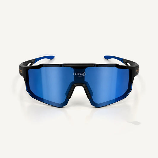 Tyffco Racer sunglasses in Blue, three-quarter view, studio on off-white background.