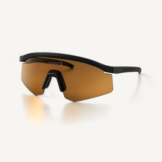 Tyffco Vega sunglasses in Bronze, three-quarter view, studio on off-white background.